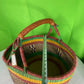 A Beautiful Hand Woven African Basket With A Leather Bound Handle