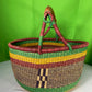 A Beautiful Hand Woven African Basket With A Leather Bound Handle