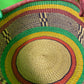 A Beautiful Hand Woven African Basket With A Leather Bound Handle